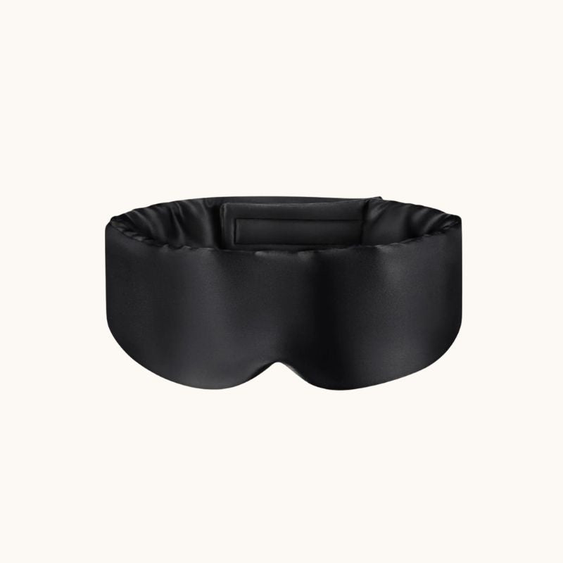 Black sleep mask on a white background